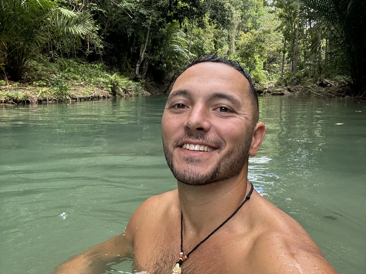 Swimming a jungle river in Southeast Asia